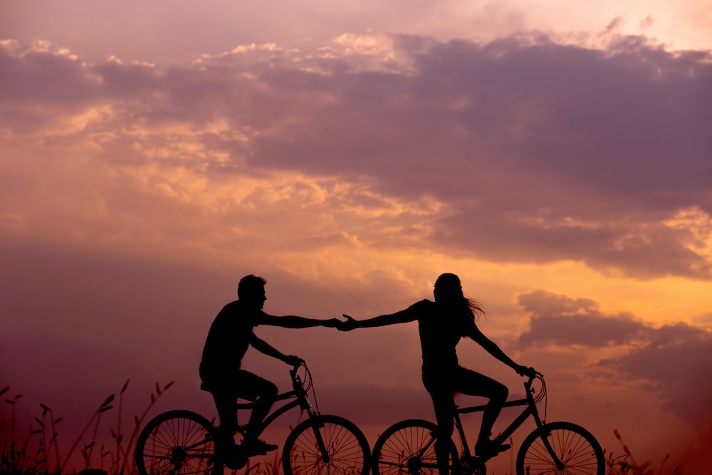 A couple riding bicycles